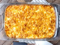 Cheesy potatoes with corn flakes on top recipe